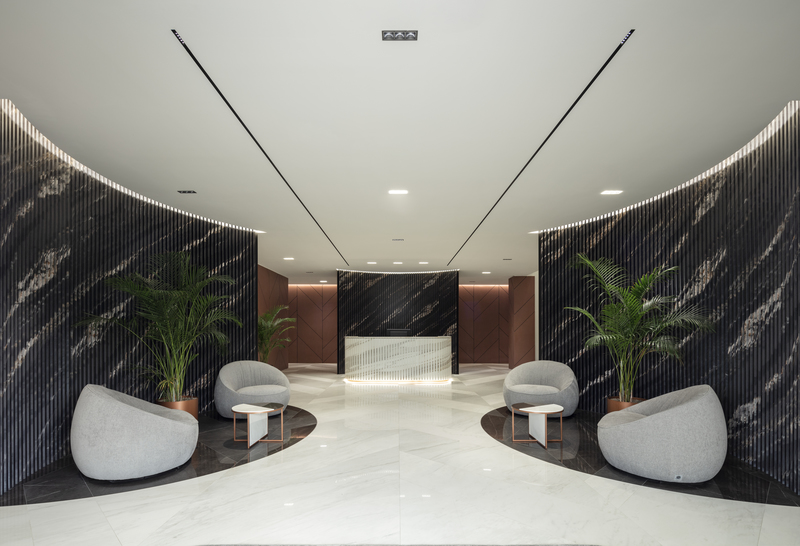 Restyling the interiors of the historical Fiandre headquarters in Castellarano, with a focus on cutting-edge applications, permeable spaces and peoples well-being